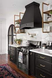 Kitchen cabinets are either the bane of your existence or your lifeline, depending on whether you have enough of them and how organized they are. Bold Kitchen Design Black Cabinets Modern Farmhouse 110267890865011102 Kitchen Design Small Kitchen Design Kitchen Inspirations