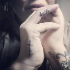 Faith tattoos are generally associated your faith in god, but these very popular tattoos are inked for many different reasons also. Faith And Cross Cute Finger Tattoos Designs Blurmark