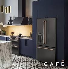 Deep Navy Cabinets With Matte Black Appliances From Cafe Appliances By Ge At Kbis Modern Kitchen Design Interior Design Kitchen Home Decor Kitchen