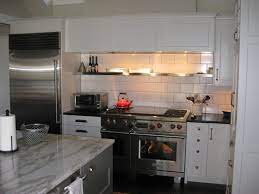 Stainless Steel Shelving Above Range With Warming Lights Above To Keep Casseroles Warm Before Servi Kitchen Remodel Inspiration Kitchen Flooring Kitchen Design