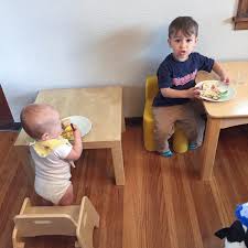 Montessori Babies Eat At Small Tables While Still Enjoying Family Means The Montessori Weaning Table H Montessori Toddler Montessori Baby Montessori Parenting