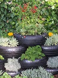 15 Creative Ways To Make An Herb Garden Herb Garden Design Small Garden Design Tire Garden
