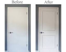 Self Adhering Three Piece Applied Door Moulding Get The Custom High End Look In Your Home With Luxe Architectural Two Panel Doors Door Molding Door Makeover