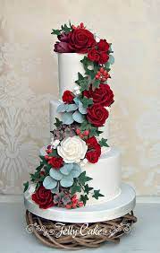 Winter Floral Cascade Wedding Cake Wedding Cake Fresh Flowers Christmas Wedding Cakes Colorful Wedding Cakes