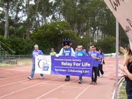 Luminaria bag, pipe cleaner, and a doily, cut in half. Relay For Life Students And Cancer Survivors Walk For Awarness The Bottom Line