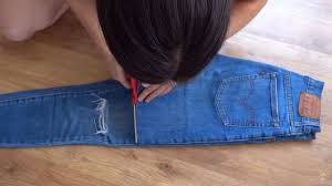 Take measurements first, slip on your jeans and use chalk to mark your desired length. How To Cut Jeans Into Shorts In Just 6 Easy Steps Upstyle