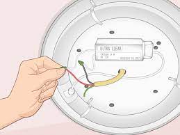 To meet code in our area that prevents fixtures from hanging by wires, we had to run the new wire beside the chain rather than threading it through. How To Install A Light Fixture 10 Steps With Pictures Wikihow
