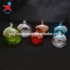 This whimsical spheres of clear hand blown glass is the perfect container for plant terrarium display. Blown Hanging Colored Glass Ball Candle Holder Glass Orb Globe Terrariums Buy Hanging Glass Candle Holder Colored Glass Ball Round Ball Glass Candle Holders Product On Alibaba Com