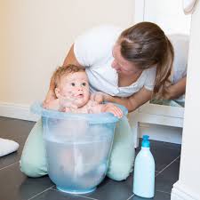 Sitting in a prenatal position, embraced by the warm water around them, makes babies feel relaxed and safe. Tummy Tub Bath Bucket Blue Amazon De Baby Products