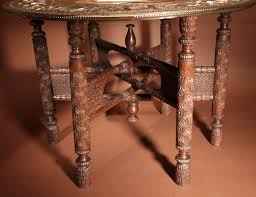 Middle eastern antique brass tray table on gilt iron stand. A Very Decorative Anglo Indian Middle Eastern Possible Mughal Empire Folding Coffee Table Circ Low Table