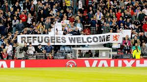 He embarks on a journey where he will confront outer dangers. German Clubs To Wear Refugees Welcome Logo