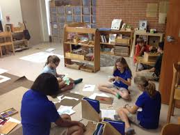 Upper Elementary Montessori Students Working With Archimedean Solids Lakeland Montessori In Montessori Elementary Upper Elementary Classroom Montessori School
