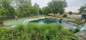 Watch out for the dinosaurs and the erupting volcano! Lancaster Fun Center Reopens Mini Golf Course Dimple Times