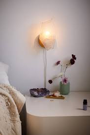 A natural oak wood disc with polished surface emphasizes the natural character of this wall lamp. 13 Best Plug In Wall Sconces Modern Plug In Wall Lights