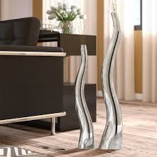 The grasses vases are made of seagrass and bamboo, a grass that is treated like and behaves like wood. Candle Vases Wayfair