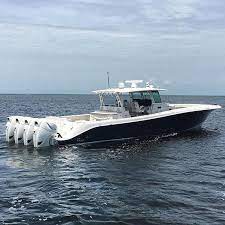 World S Largest Outboard Center Console Will Give Your Boat Self Esteem Issues Center Console Fishing Boats Sport Fishing Boats Offshore Boats