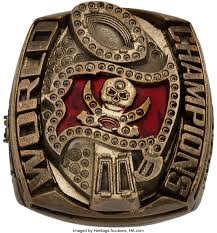More like the tampa bay buccaneers' signature flag logo carved from a red stone on top. 2002 Tampa Bay Buccaneers Prototype Super Bowl Xxxvii Ring Lot 50652 Heritage Auctions