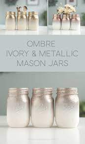 Metallic Rose Gold Gold Rose Chrome And Ivory Mason Jars Ombre Painted With A Splash Of Glitter Masonjars Mason Jar Crafts Diy Diy Jar Crafts Mason Jar Diy