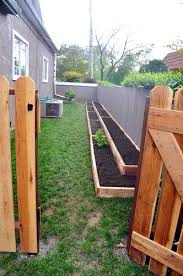 Raised Bed Gardening In Narrow Spaces I Have A Big Backyard But This Might Also Work Along Our Back Fence In Addition Diy Raised Garden Backyard Garden Beds