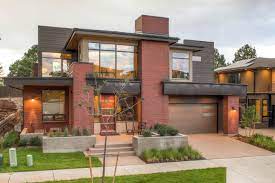 Maybe you would like to learn more about one of these? The Very Modern Exterior Of The Home Features Red Brick And Dark Brown Wood Siding Th Sovremennyj Dizajn Doma Kirpichnye Doma Sovremennyj Dizajn Eksterera Doma