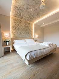 Lampadario smart tv per camera matrimoniale : Illuminazione Camera Da Letto Guida 25 Idee Per Illuminare Al Meglio Camere Da Letto Moderne Start Preventivi