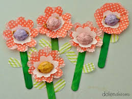 Cupcake liners flowers from one little project. Cupcake Liner Flowers With Chocolate Candy Centers Cupcake Liner Flowers Mother S Day Diy Mothers Day Crafts