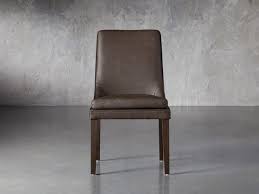 Lunden Faux Leather Dining Chair Arhaus In 2020 Faux Leather Dining Chairs Leather Dining Chairs Dining Chairs