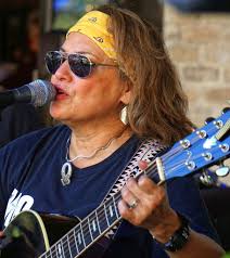 Close-up of Cathy Ruiz, lead vocals for MC & The Mystyx, P…