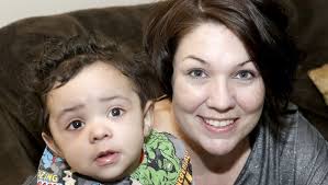 Canton mother survives heart attack while delivering son