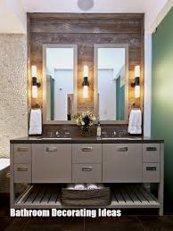 Make Your Bathroom Look Bigger With These Bathroom Decorating Ideas Best Bathroom Lighting Bathroom Vanity Designs Farmhouse Chic Bathroom