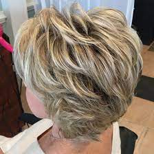 If you have medium textured hair with slight curls, this hairstyle will look best on you. Short To Medium Feathered Hairstyle For Older Women Modern Hairstyles Hair Styles Thick Hair Styles