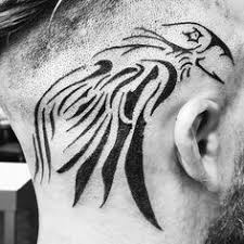 Crown tattoos are opted for by both the genders. Tribal Norse Raven Tattoo On Head For Men Tattoos Raven Tattoo Neck Tattoo