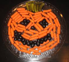 Adorable Halloween Veggie Tray Carrots Black Olives For Eyes Nose And Mouth And Pickles For A Stem Veggie Tray Halloween Veggie Tray Halloween Treats
