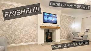 This york home has made a stunning feature in their living room by expanding the chimney breast to the side into alcoves as well as bring the elevated hearth forwards so the wood burner is more prominent. Completing Our False Chimney Breast Diy Journey Youtube