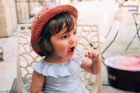 See more ideas about kids outfits, cute toddlers, kids fashion. Cute Toddler Girl Eating An Ice Cream On A Terrace Stockphoto