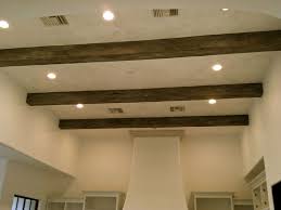 I installed faux wood ceiling beams and put faux shiplap planks over my popcorn ceiling as part of my living room makeover. 5 Ideas For Faux Beams In Your House Decorative Ceiling Tiles Inc Store