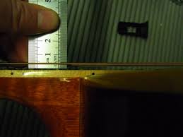 Many, many guitars have adjustable saddle height, and this is by far the easiest and safest way to adjust the action on a guitar. Guitar Maintenance