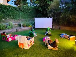 Your complete outdoor/indoor home entertainment system includes epson silver edition projector. How To Set Up An Outdoor Movie Night For Kids Hello Wonderful