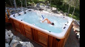 Just because you're installing a swim spa above ground does not mean it has to be boring! Swim Spas All Weather Pools For The Family Arctic Spas