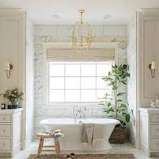 Bathroom chandelier concerns the national electric code (nec) from 2011 requires that any part of a light fixture, including crystals dangling from chandeliers, must be a minimum of 8 feet above the highest portion of a tub's walls. Chandelier Over Tub Design Ideas