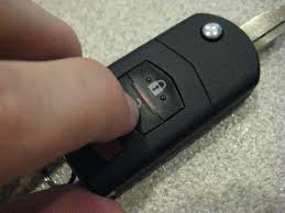 Place the battery cover back in, then reattach the sides of the key fob. Mazda Cx 9 Key Fob Remote Control Battery Replacement Guide 017