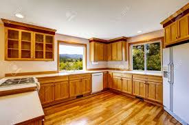 light brown kitchen cabinets, white