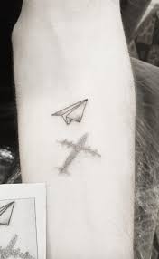Paper Plane Tattoo Inkstylemag Plane Tattoo Paper Plane Tattoo Origami Tattoo