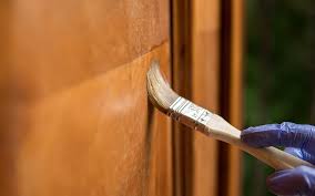 A Person Applies Stain Remover To A Wooden Surface With A Brush In 2020 Staining Wood Diy Wood Stain Sanding Wood