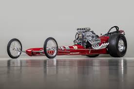 This design is notably safer as it puts most of the fuel processing and rotating or reciprocating parts of the dragster behind the driver. 1964 Fuller Roberts Starlite Iii Top Fuel Dragster 6002