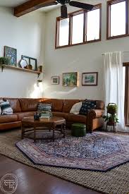 The modern living room is also a family gathering space, where the pace of the day begins to slow down. Electic Vintage Modern Living Room With Antique And Vintage Finds With Modern Colors Of Green Black And Blue 3 Refresh Living
