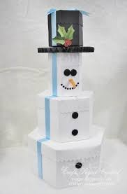 This festive snowman gift tower is actually a set of 4 nested boxes that they will be able to pull out each year to decorate their holiday home! Cpc Snowman Gift Box Tower Snowman Gift Boxes Gift Towers Homemade Gift Boxes