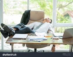 Tired Businessman Sleeping In The Office With His Feet Up On The Desksleeping Businessman Tired Desk Desk The Office Office