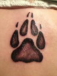 A paw print tattoo is a beautiful, personal way to show love for your pet, or to symbolize the animal within you. Pin By Christine Ward On Loves Wolf Print Tattoo Wolf Paw Print Wolf Paw Tattoos