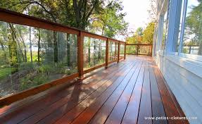 The glass is about 1/4 thick and almost 36' tall. Ipe Balcony Sehn Patios Et Clotures Beaulieu